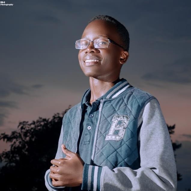 Larry Adhola Okumu